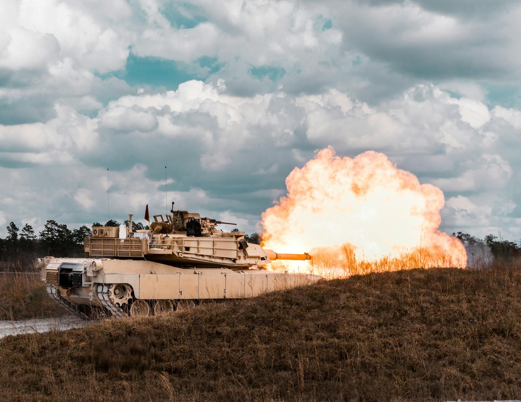 a tank firing a bullet