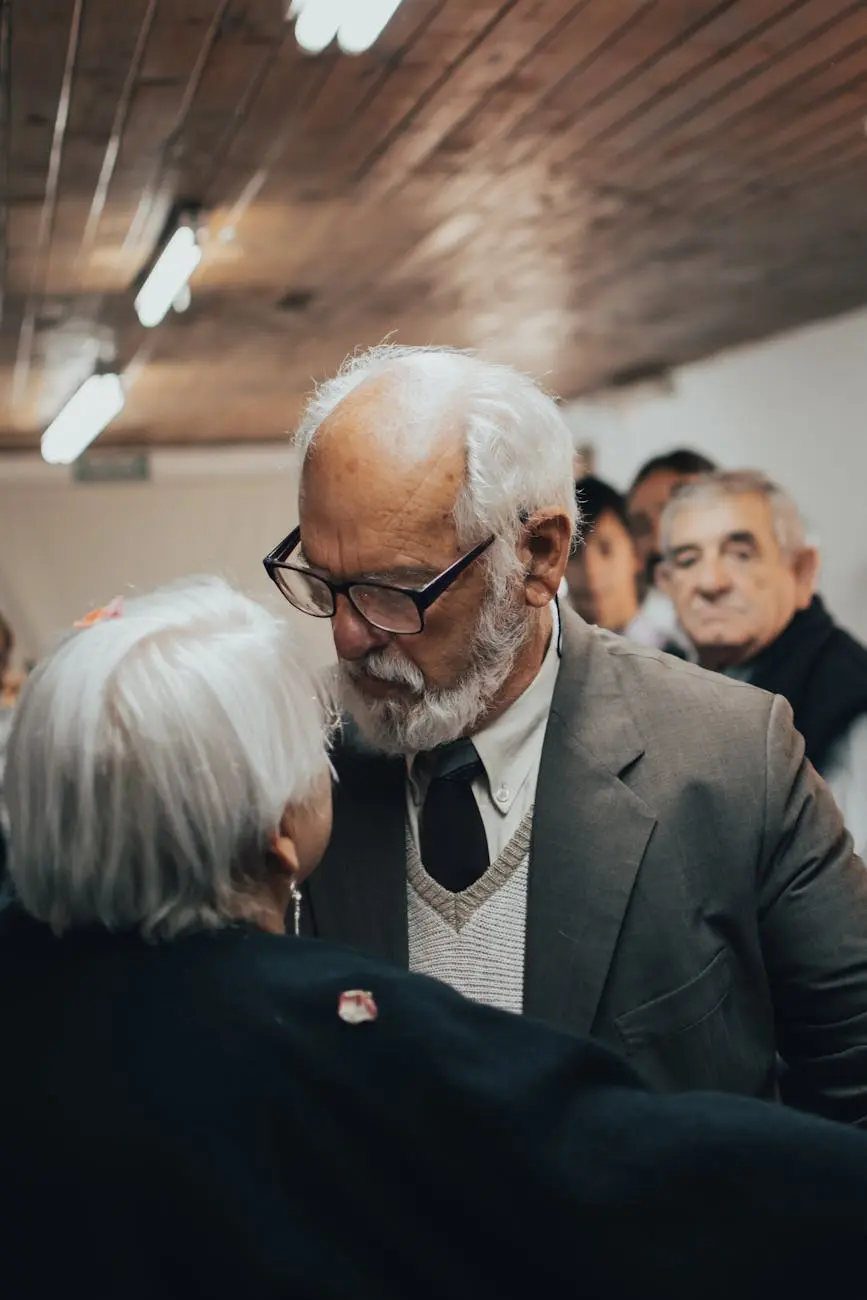 elderly man and elderly woman looking at each other